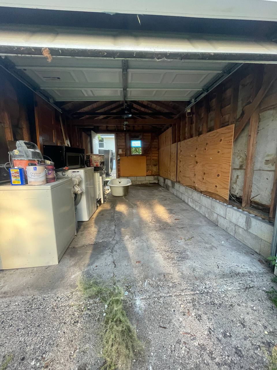 Garage floor reclaimed after a complete junk cleanout